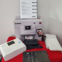Canon CP1200 Selphy Wireless  Compact Photo Printer Bundle with Canon Color Ink/Paper Set and Case