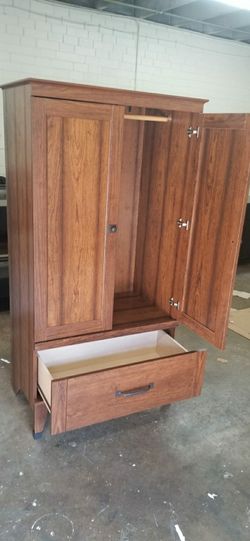 New assembled armoire cherry finish see pictures for dimensions
