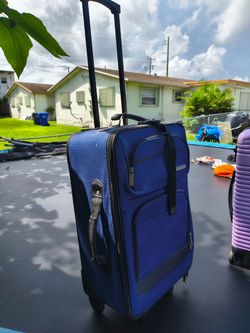 blue softside rolling upright or similar generic travel suitcase