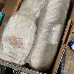Size 1 and 2 Diapers Open And New Bags