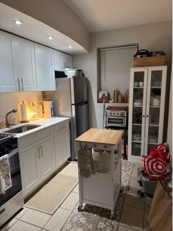 Tall White Storage Cabinet