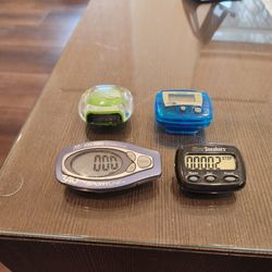 4 electronic pedometers used to track steps and distance - Sportline 340, Silver Sneakers, Smart Moves, all works great, all for $5