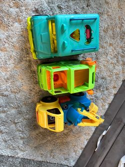 3 toy trucks