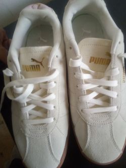 Brand new white pumas