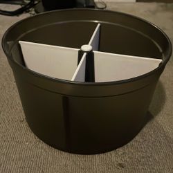 Rotating storage bin