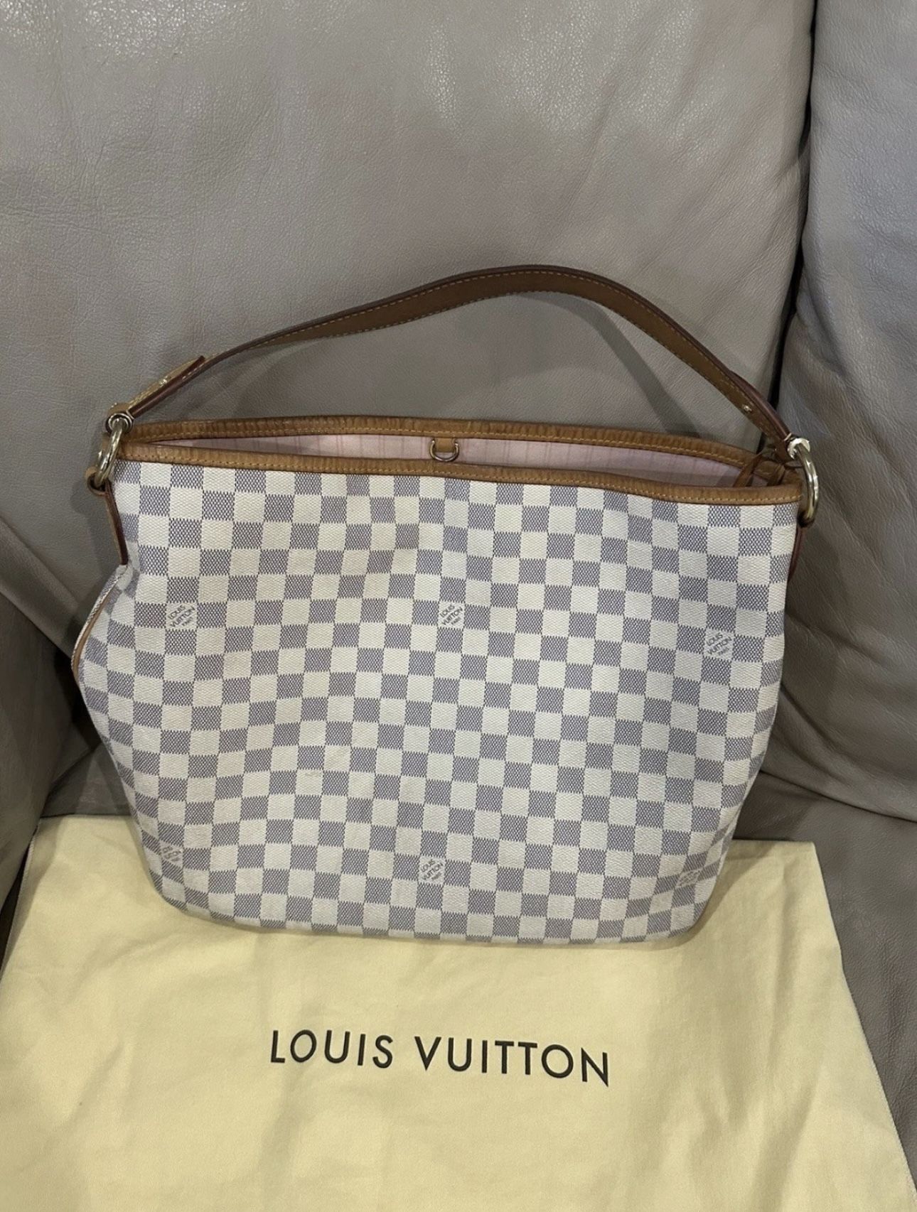 Authentic Pre-loved Louis Vuitton.