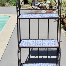 A vintage tiled metal stand