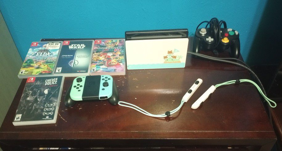 Nintendo Switch (Includes Wired GameCube Controller Two Zelda Games Star Wars And Mario Kart)