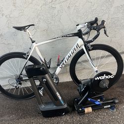 700’s specialized  full carbon fiber road bike with training equipment 