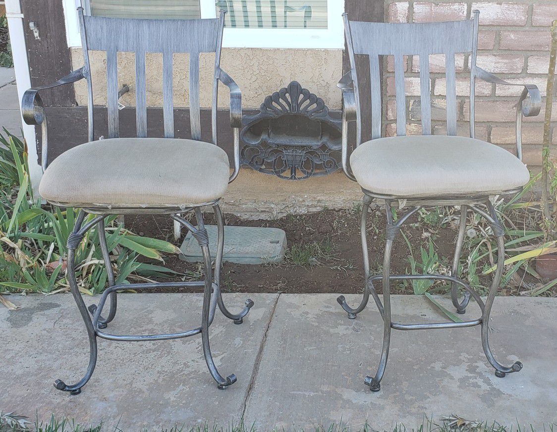 Swivel bronzed bar stools