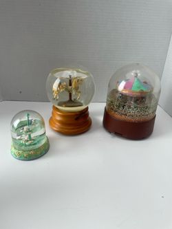 vintage musical carousel snow globes