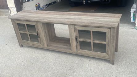 Grey washed wood TV stand