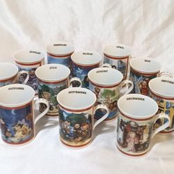 Vintage 2002- 12 Danbury Mint fine porcelain mugs