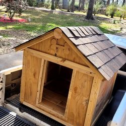 Doghouse built Out Of Plywood And Screws.Very durable. Width 42" X HEIGHT 42" X LENGTH 47"$275