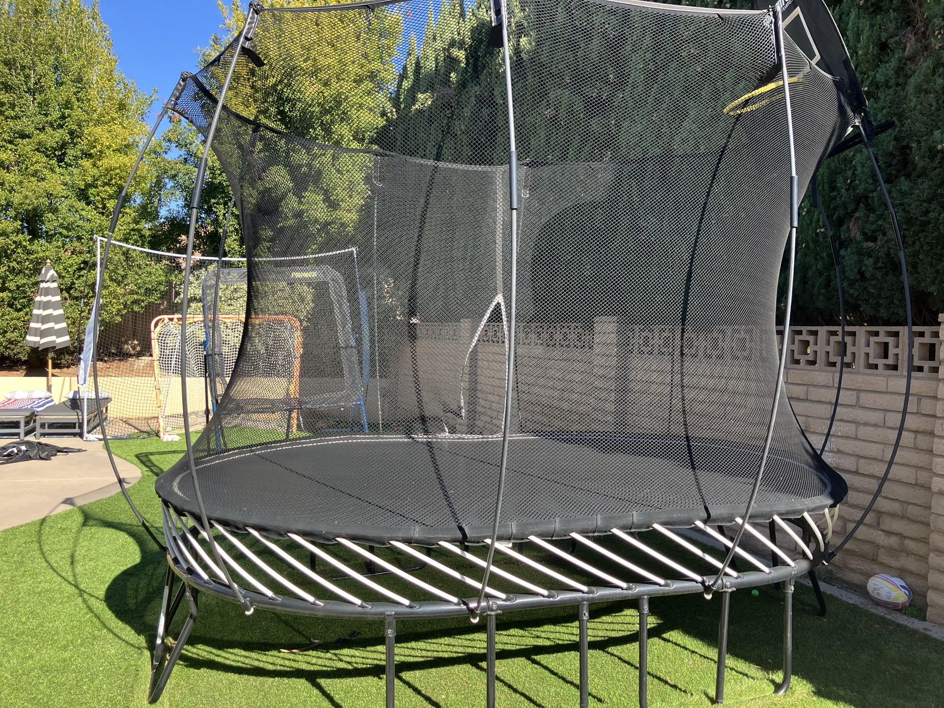 SpringFree Oval trampoline with hoop, excellent condition