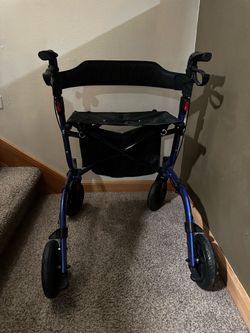 Walker with seat and basket