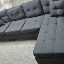 BRAND NEW SECTIONAL COUCH WITH CUP HOLDERS