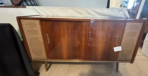 Midcentury Loewe Opta stereo console from the 1960s features a high-gloss lacquer finish