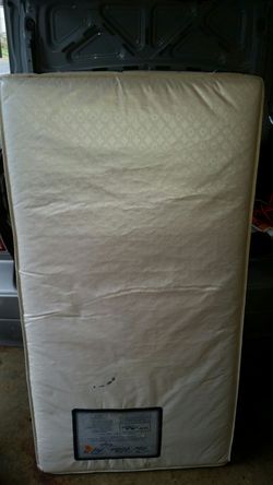 Baby crib and mattress.
