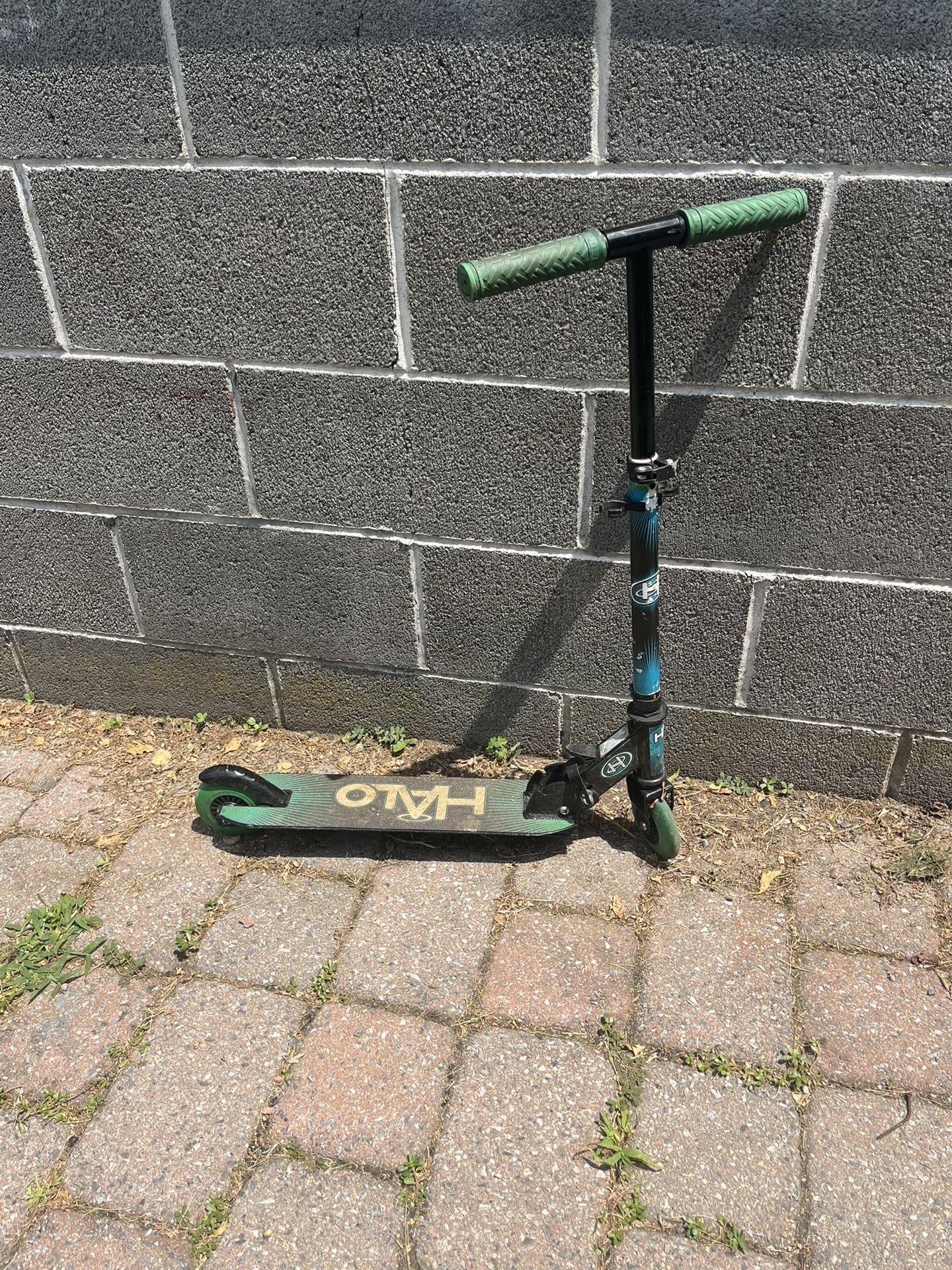 Blue, Black, And Green Scooter