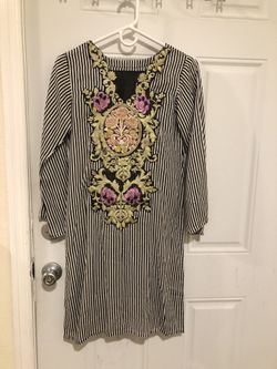 Two piece silk suits. Trousers and shirts