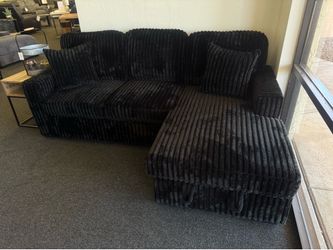 Black corduroy sleeper sofa with storage