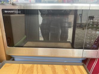 Sharpe Carousel extra large microwave. Good condition.