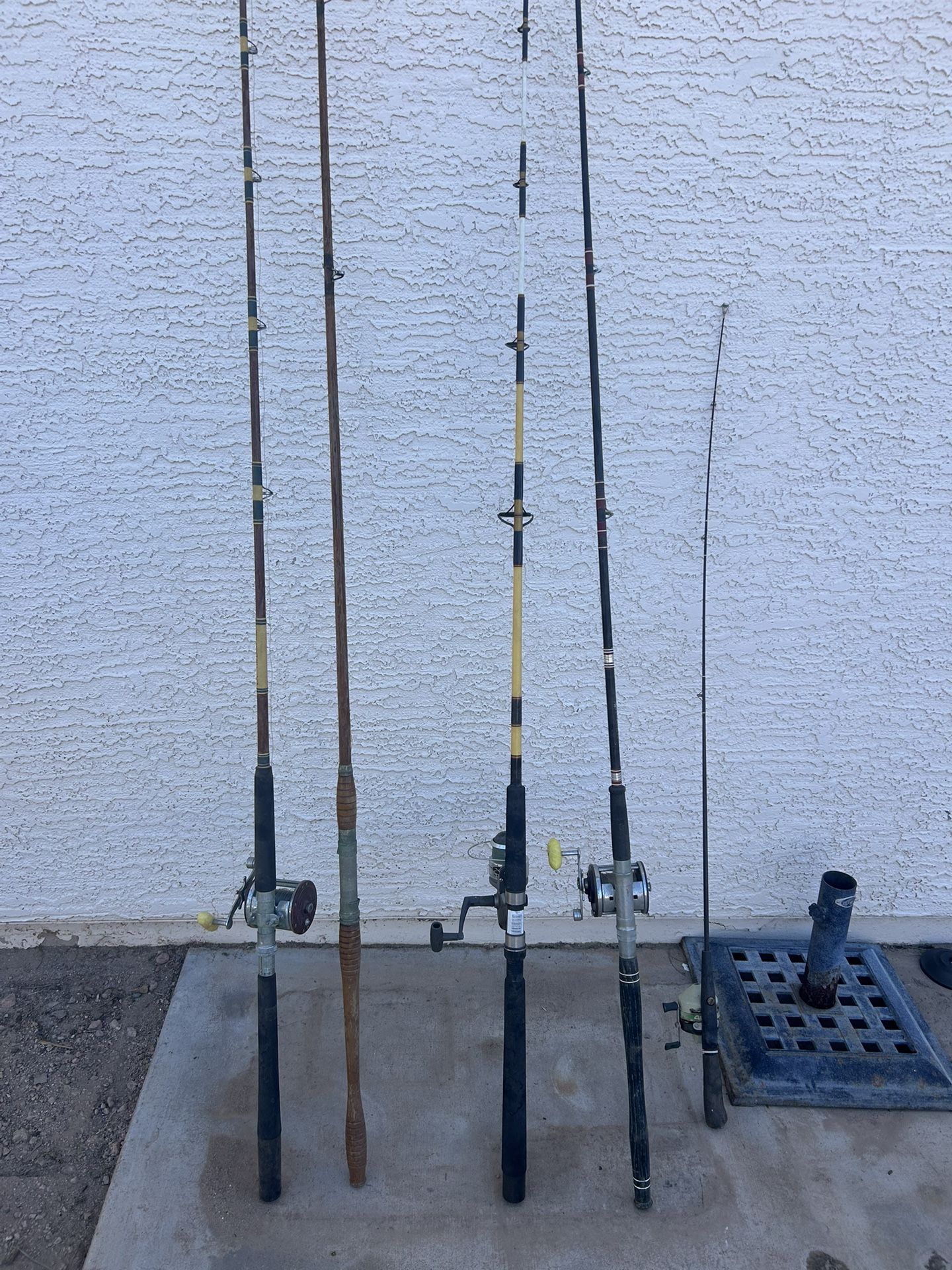 Vintage fishing poles, and the box with everything included