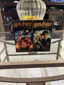 Harry Potter and the Sorcerer’s Stone and Harry Potter and the Chamber of Secrets VHS tapes