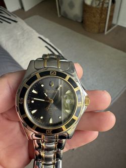 Men’s Gold And Silver Bulova Watch