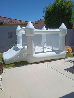 NEW....Blow up snow castle new condition includes the pump cash only please
