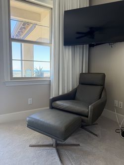 Grey Leather Swivel Armchair with Ottoman