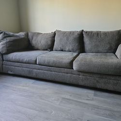 dark grey three-seater sofa. City furniture