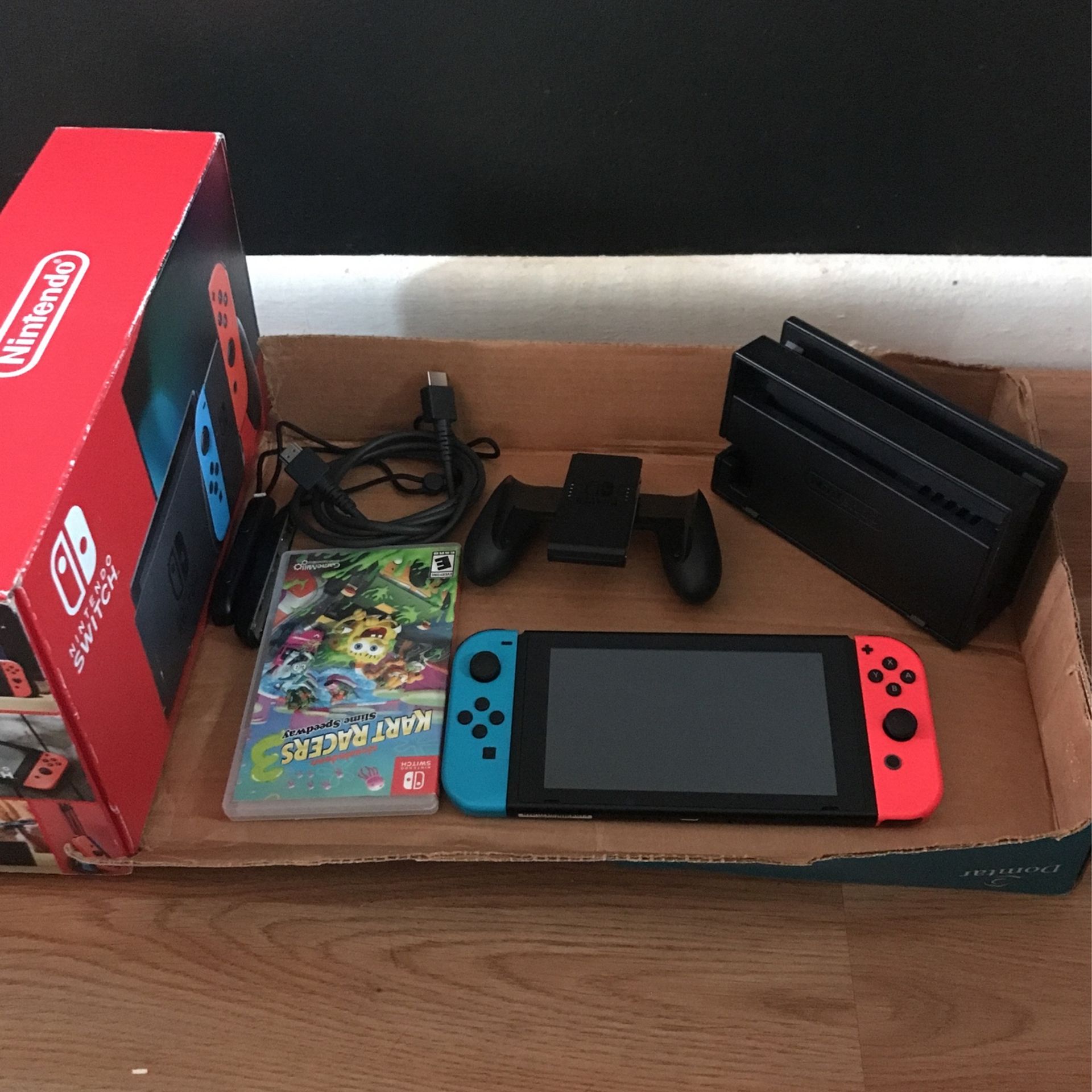 Nintendo Switch™ w/ Neon Blue & Neon Red Joy-Con