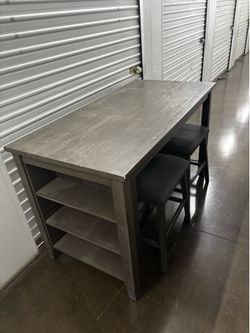 Caitbrook Counter Height Dining Table and 2 Barstools by Ashley Furniture