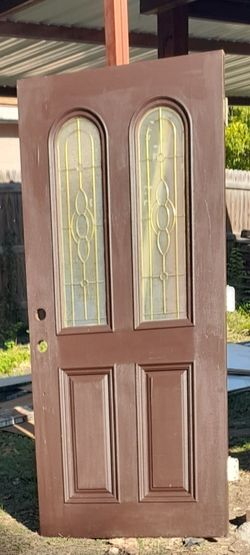 EXTERIOR DOOR..VERY HEAVY SOLID WOOD GOOD CONDITION SIZE 36 ×80