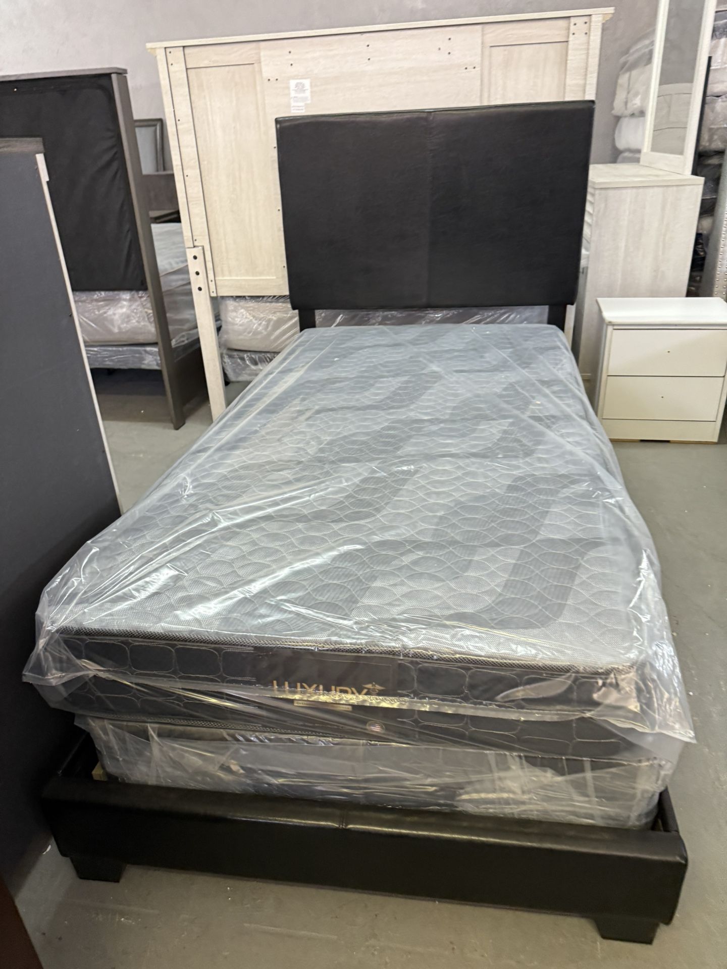 NEW TWIN BED AND MATTRESS