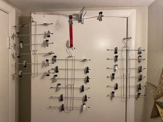 Set of metal close/ pants hangers with clips