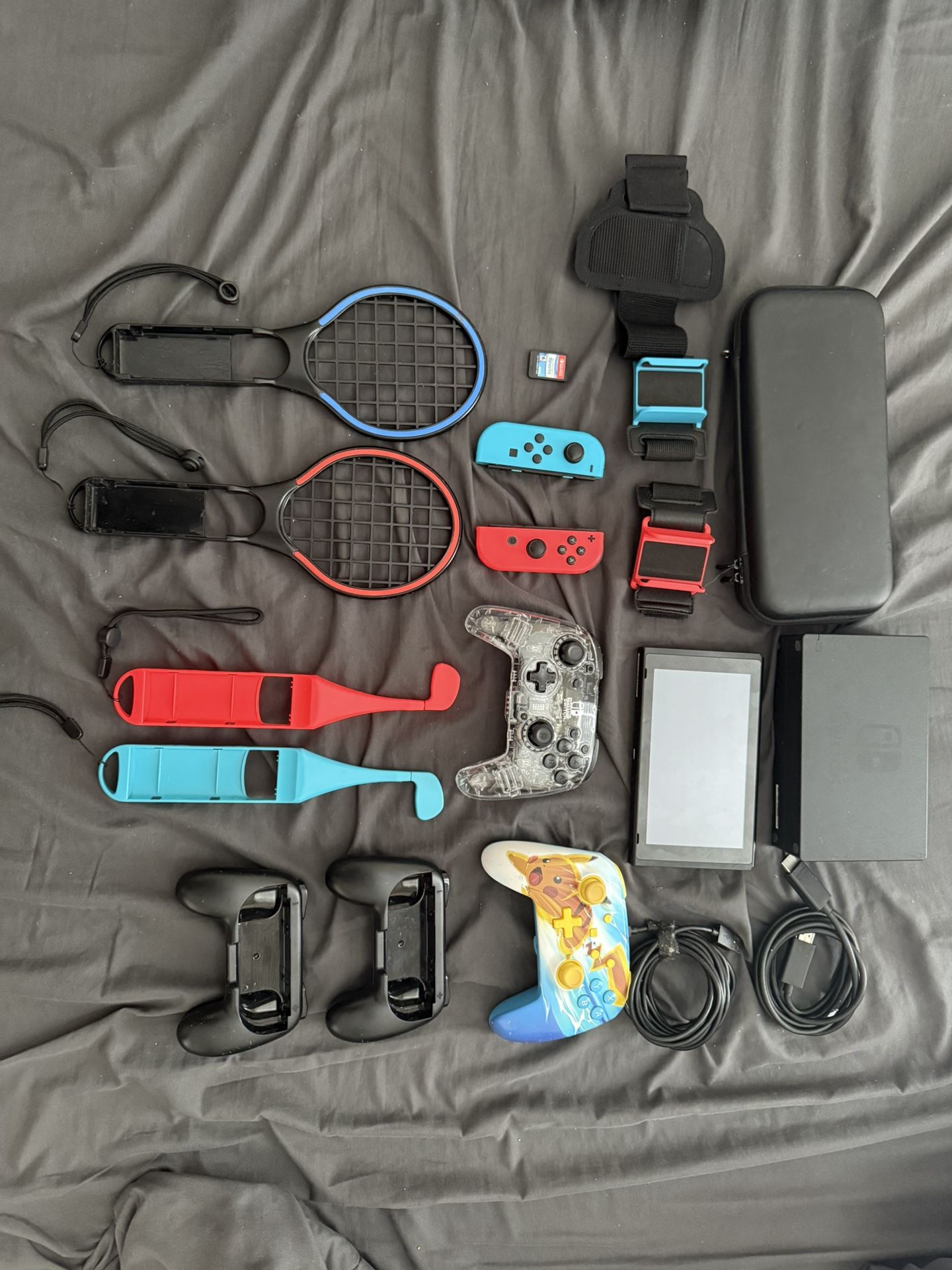 Nintendo Switch with Nintendo Sports Game, 2 Controllers, and sports accessories