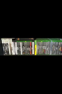 Xbox One X (1 TB) w/ over 45 games