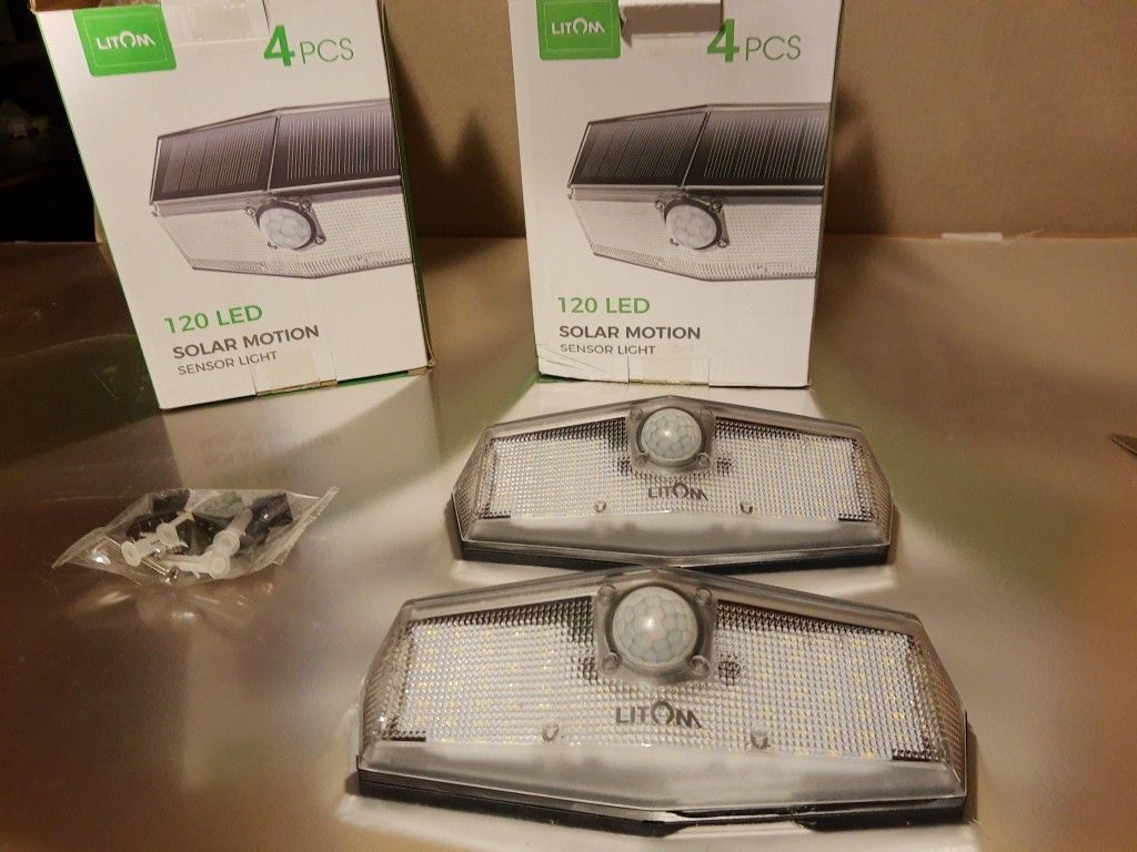 Solar Motion Sensing LED Lights 4 Pack For Outdoor Use 