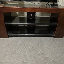Wooden And Black Glass TV Stand