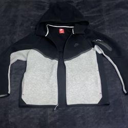 Black and gray Nike tech two-tone