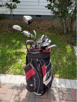 Mens left handed Cleveland golf club set.  Complete set with golf bag.