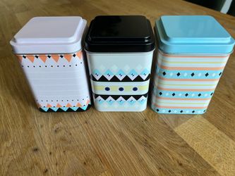 Set of cute little canisters