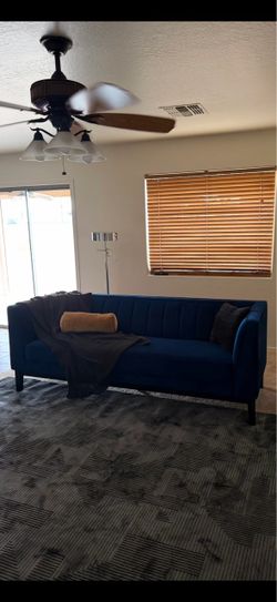 Blue loveseat couch