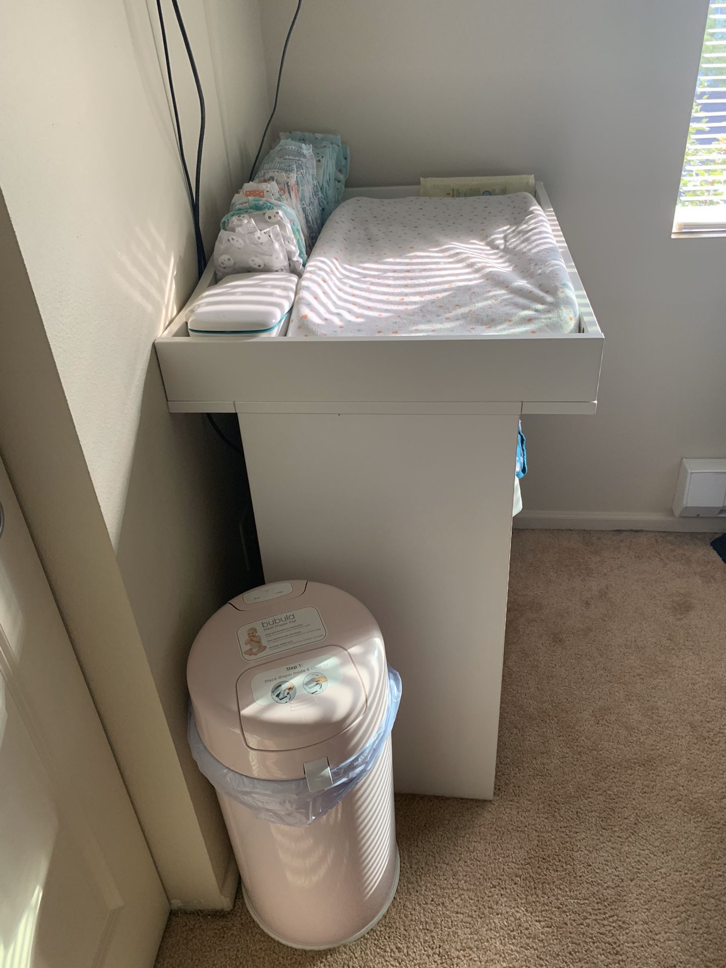Changing table and pad