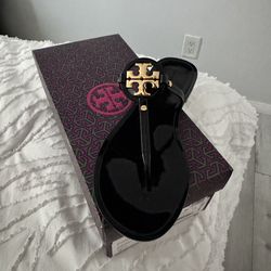 Tory Burch sandals.