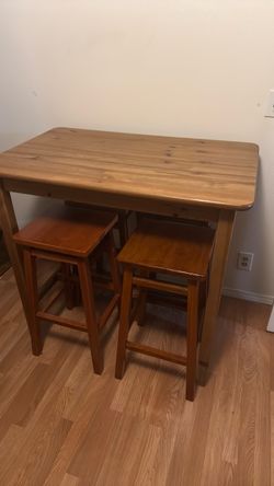 Tall table with stools