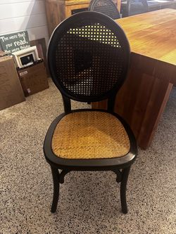 4 Black rattan and wicker chairs